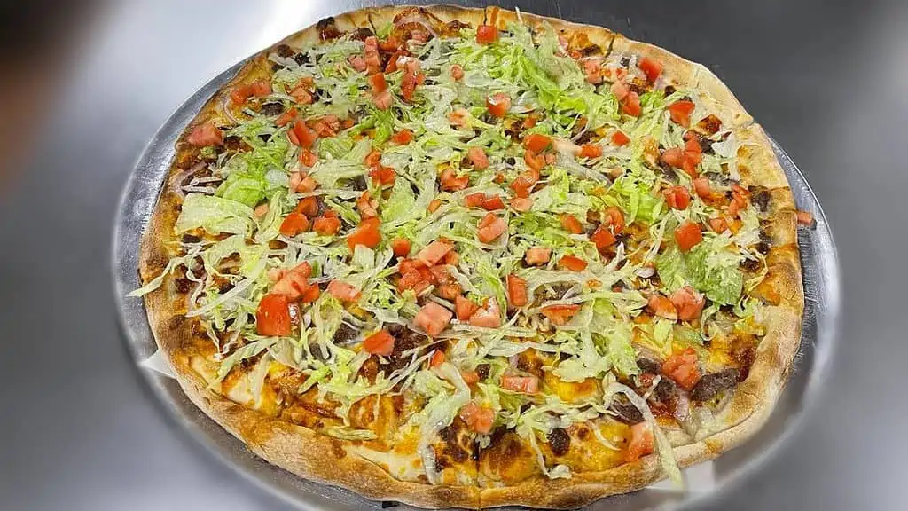 https://woodbridgepizza.net/wp-content/uploads/2022/12/TACO-PIZZA-wb-1-1024x576.webp